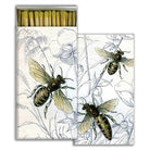 Matches in a box with illustrations of bees and flowers on the cover