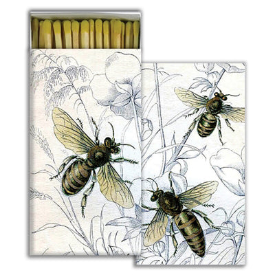 Matches in a box with illustrations of bees and flowers on the cover
